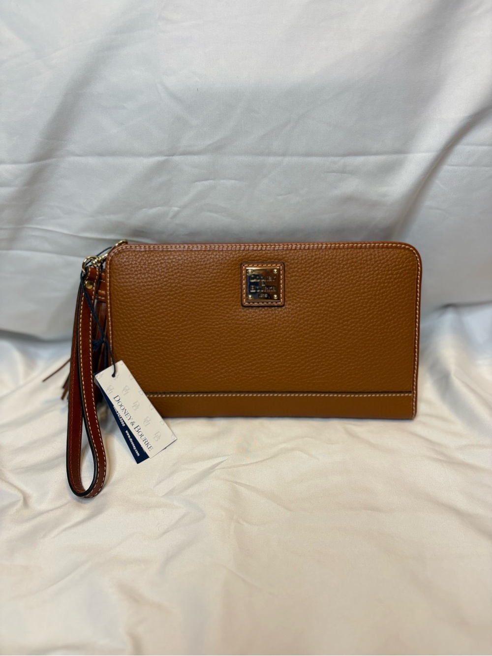 Dooney & Bourke Cognac Pebbled Leather Tassel Wristlet